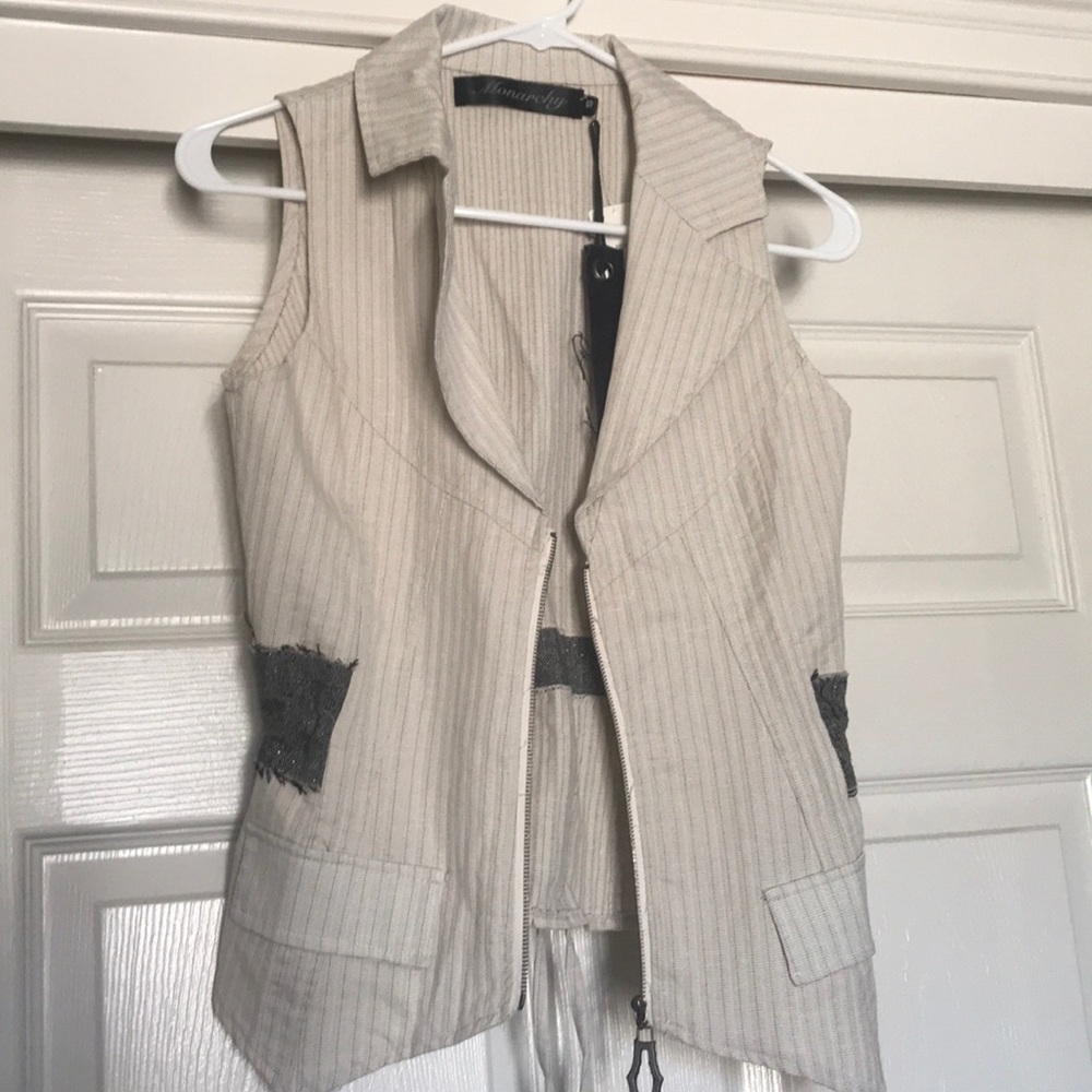 Brand new vest that ties in back